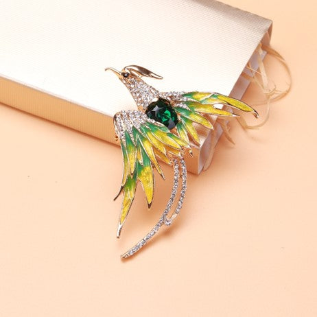 elegant enamel bird brooch