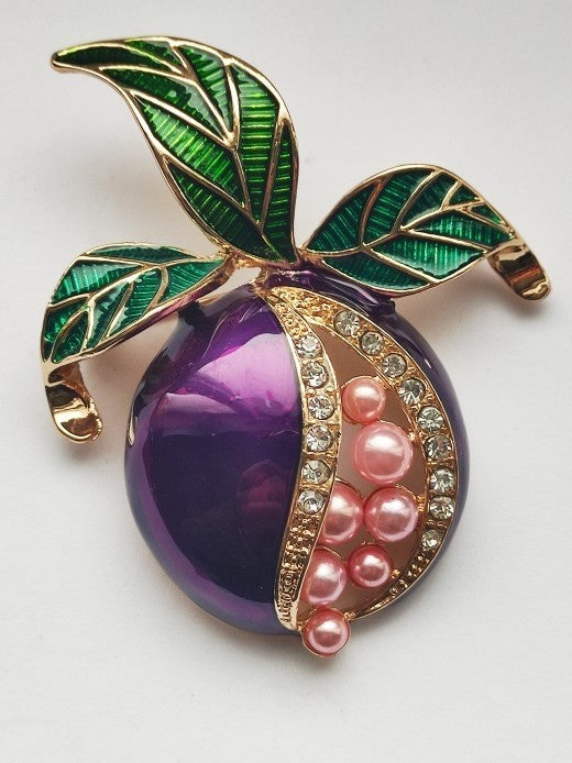 elegant enamel brooch