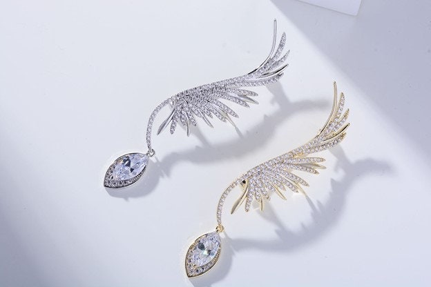 elegant angel wings brooch