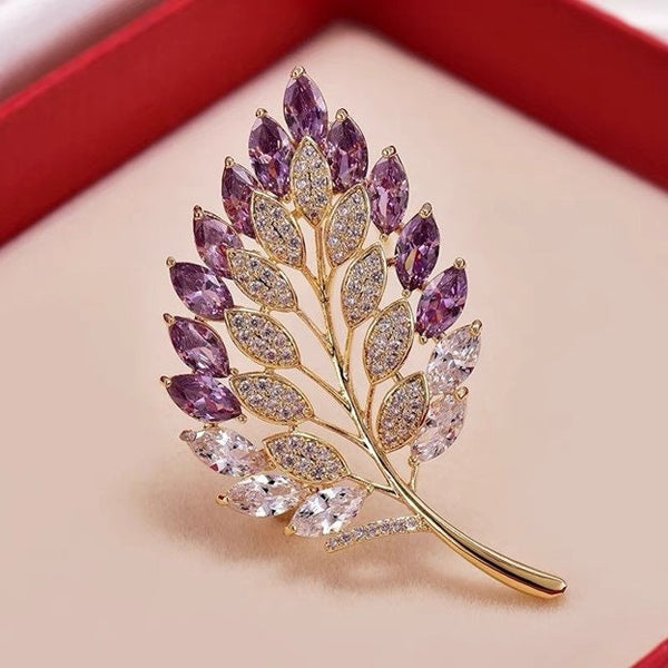 elegant crystal leaf brooch